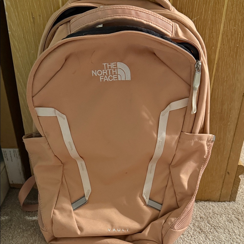 The North Face Vault Backpack in pink and White